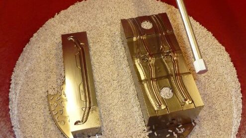 Molds being cleaned in media